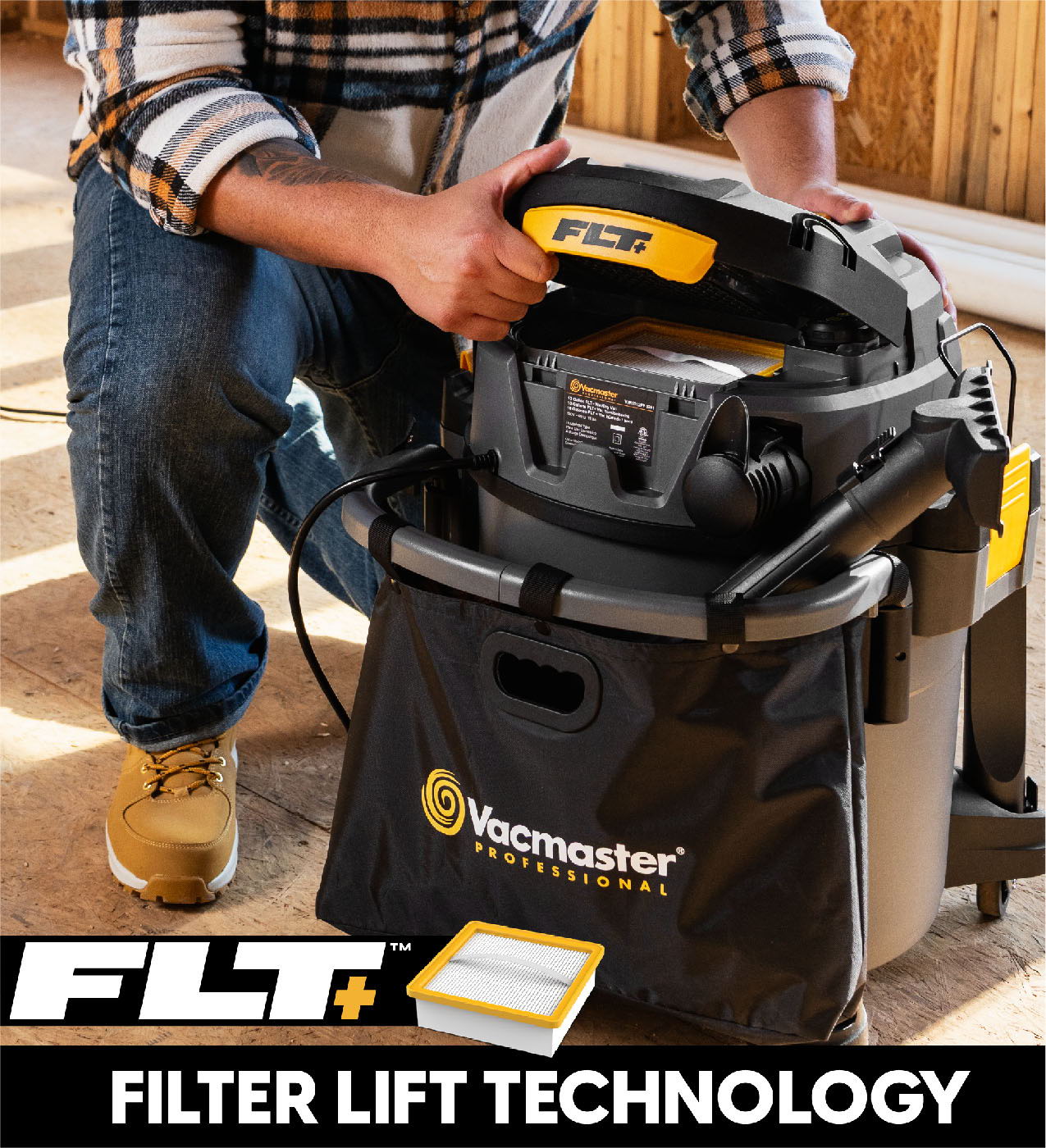 Person using a Vacmaster vacuum with Filter Lift Technology.