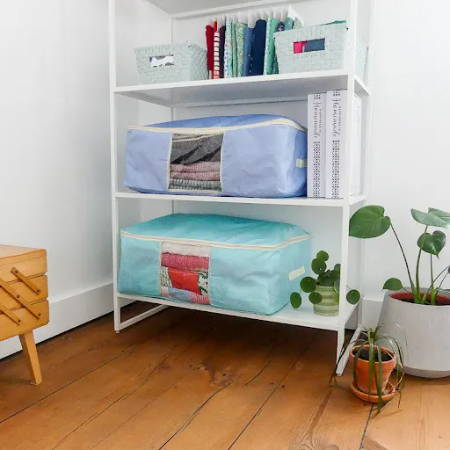 Quilt Storage Bags on a Shelf