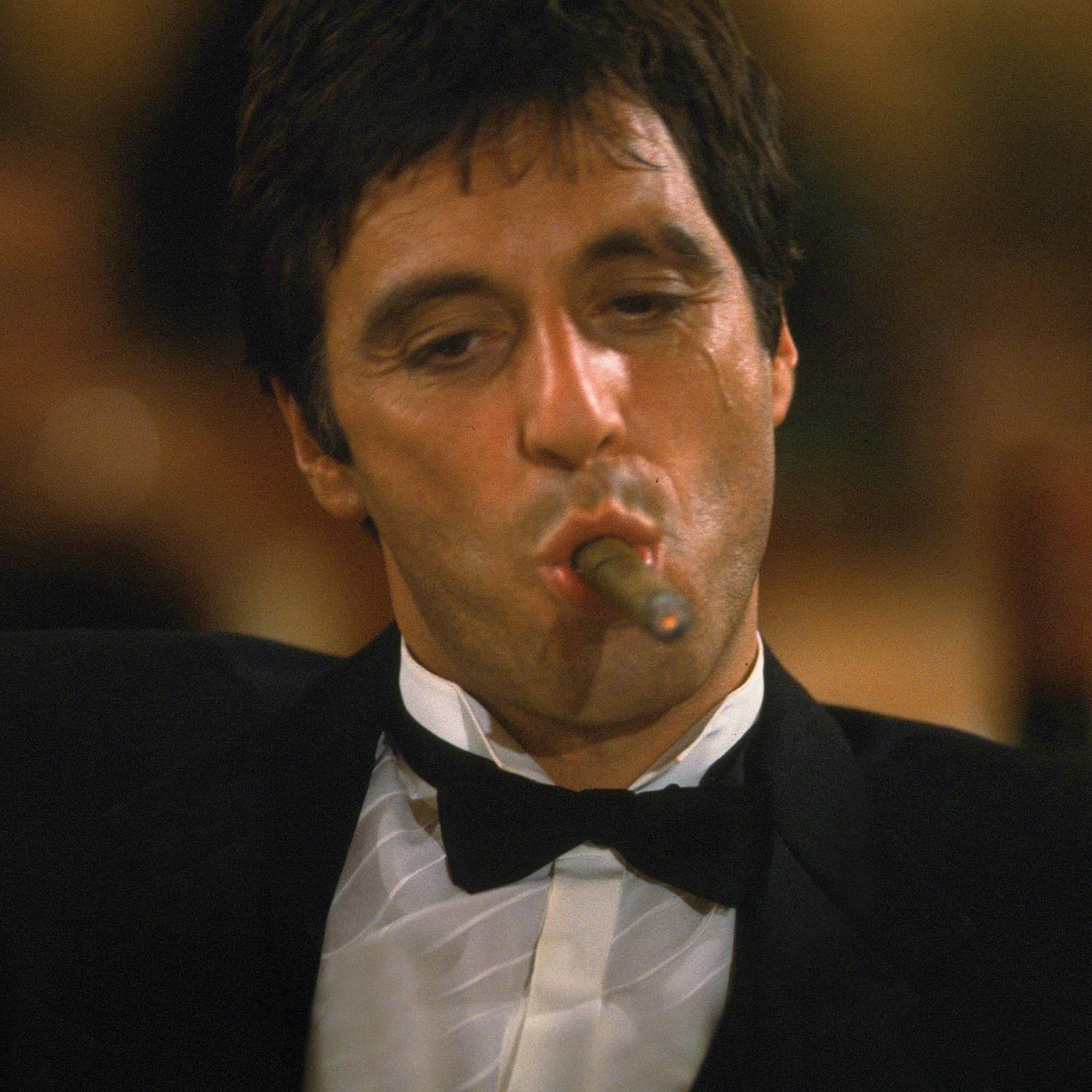 tony montana smoking a cigar