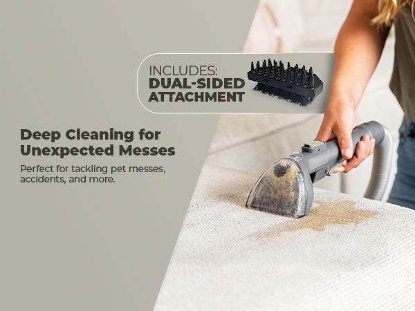 Close-up of person cleaning a couch with an extractor tool