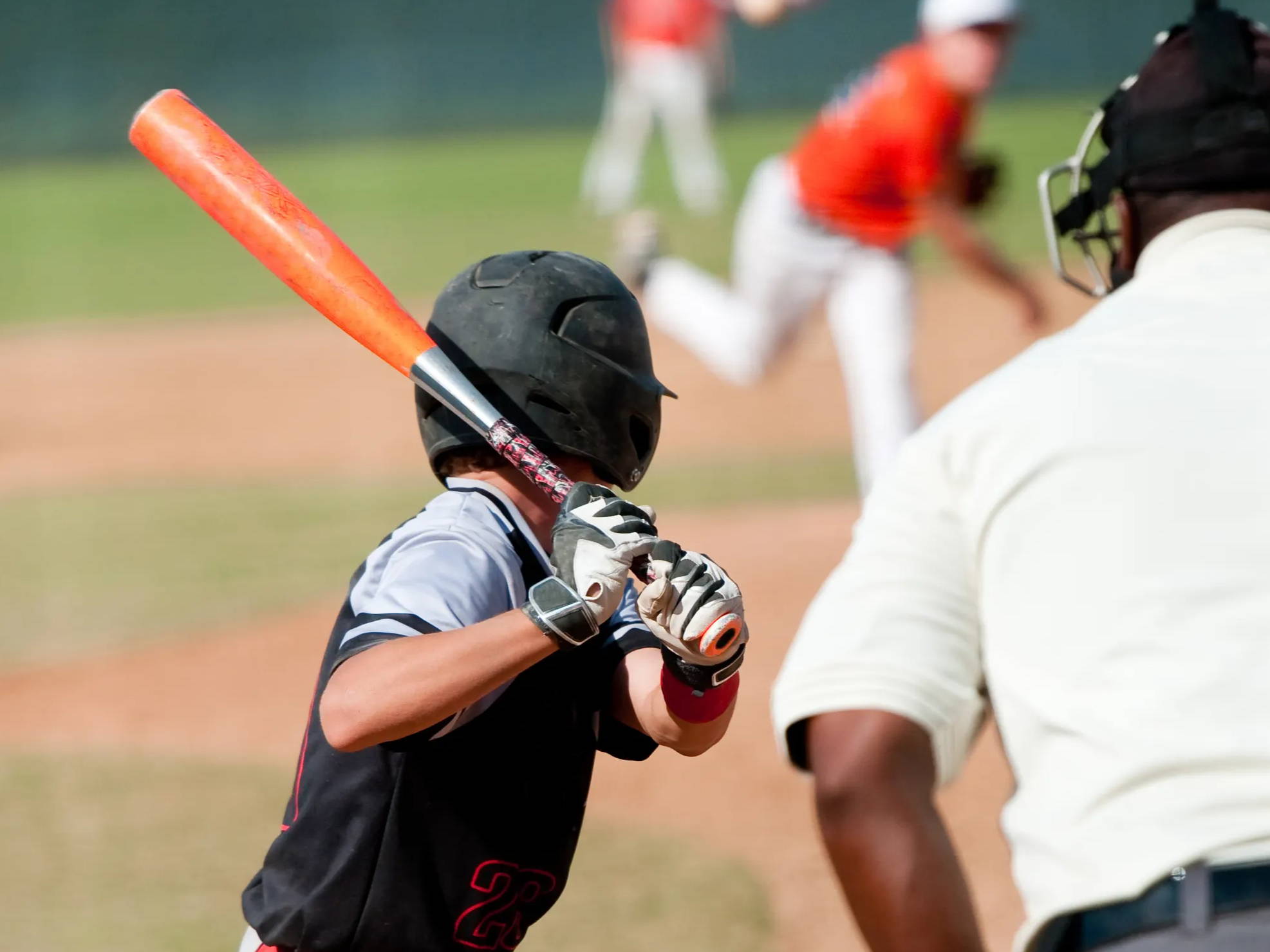 Kid up to bat playing baseball