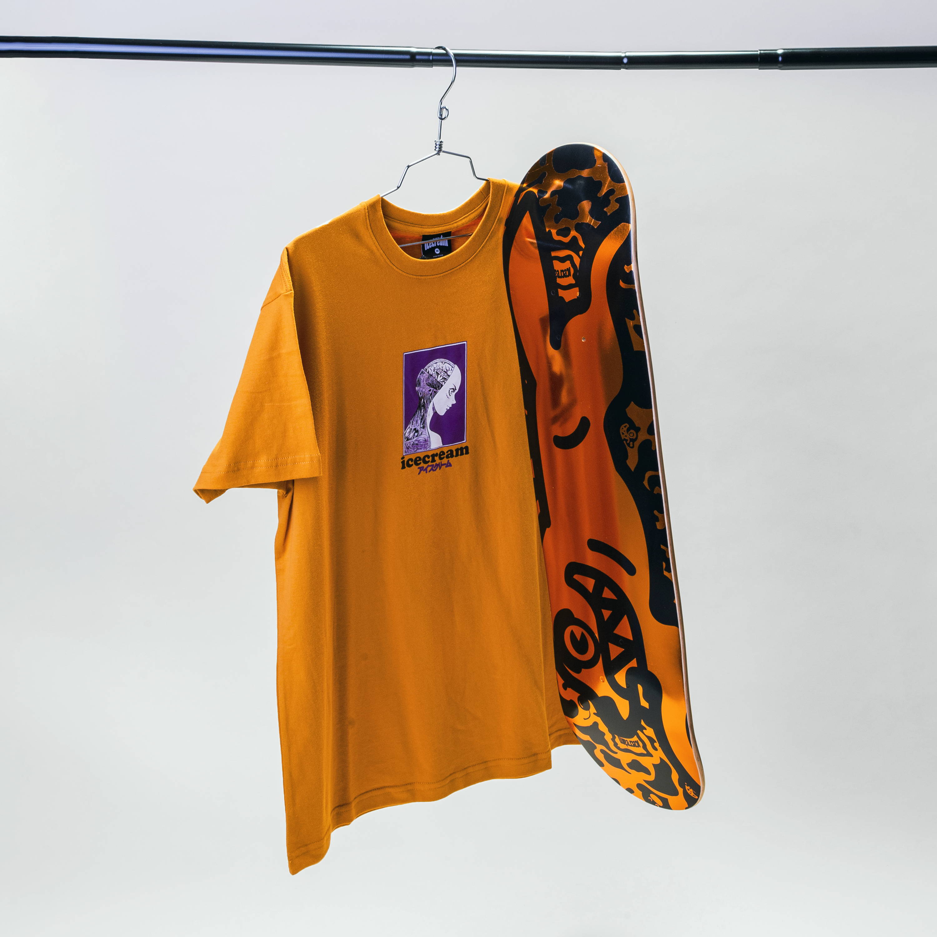 orange icecream shirt hanging with skateboard