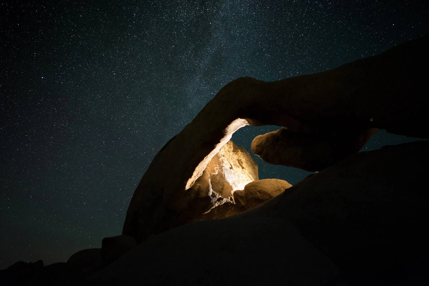 Rock formation at Joshua Tree under and starry night sky