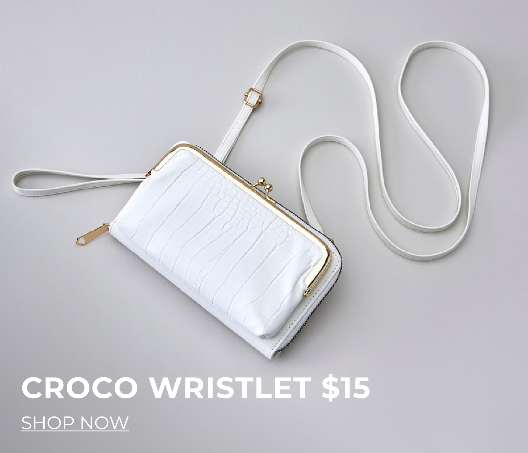 White croco wristlet with gold accents priced at $15.