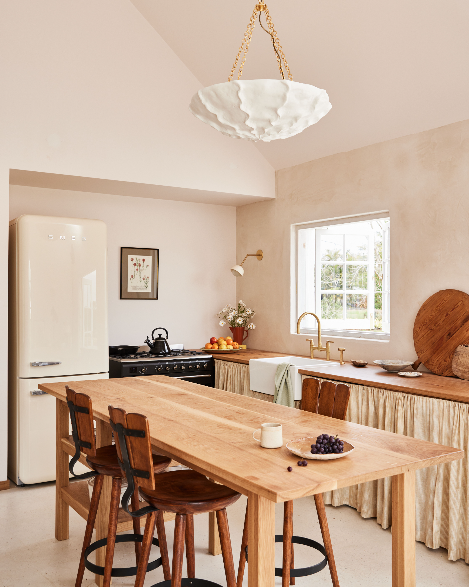 Organic Sculpted Chandelier Light above a farmhouse kitchen