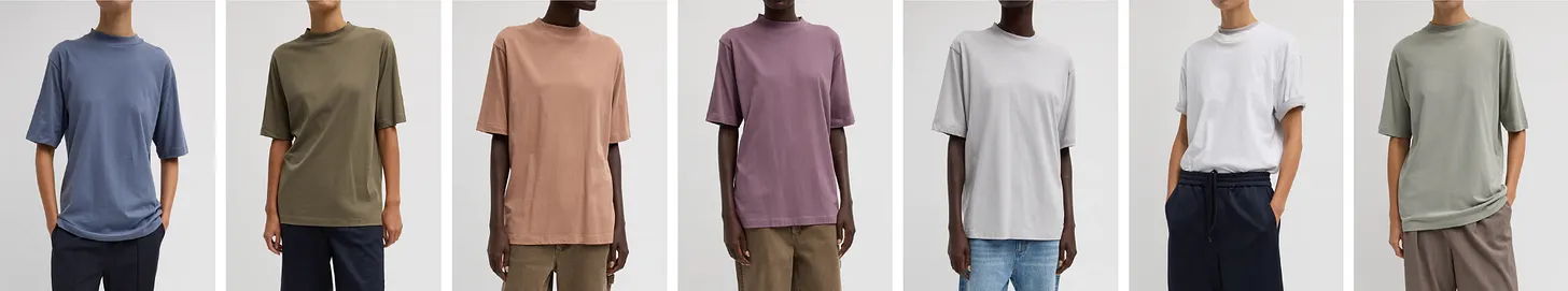 Seven models wearing various oversized t-shirts in different colors.