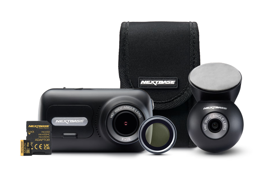 A dashcam with accessories including a case and mounting hardware.