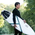 Picture of KANOA Ambassador Moritz Schreiber with performance River Surfboard