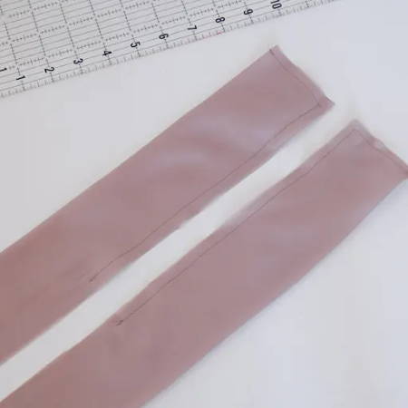 Satin fabric strip, with a stitching to make a waistband
