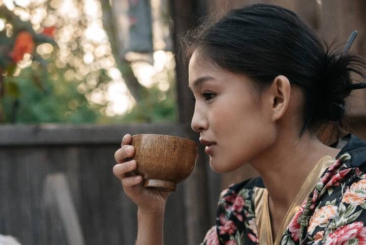 Drinking Tea from Wooden Bowl