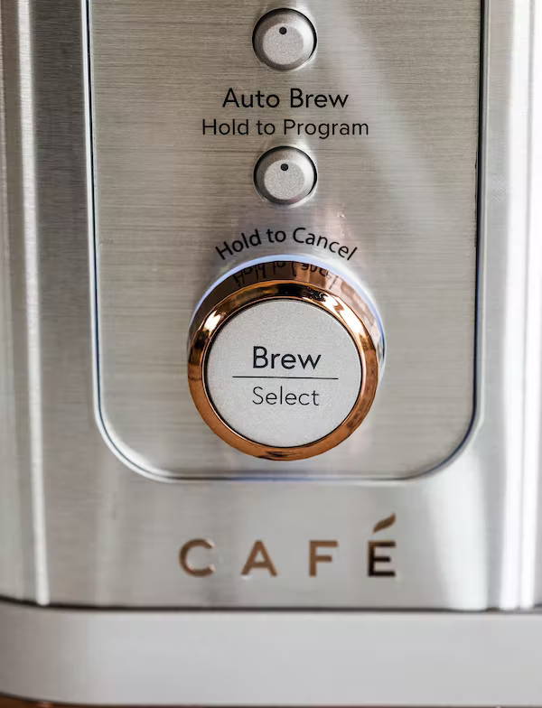 detail image of cafe coffee maker brew knob with copper accent