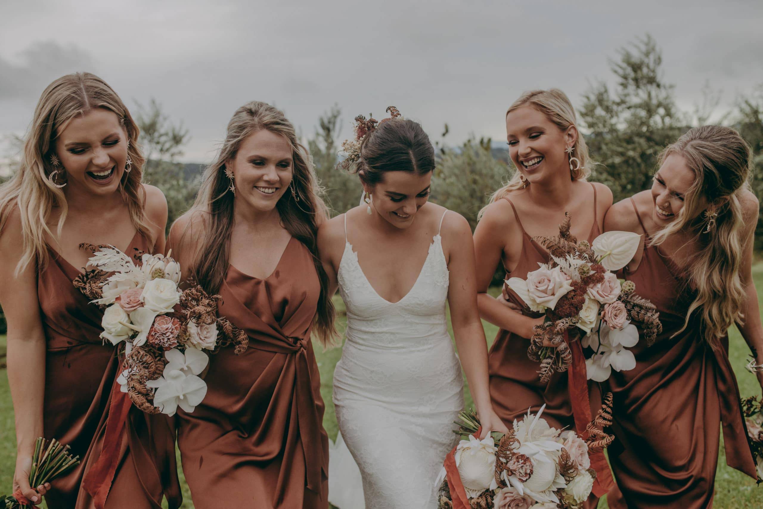 Bride wearing the Grace Loves Lace Lottie wedding dress with her four bridesmaids
