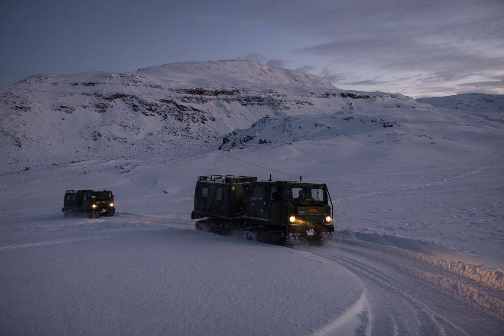 U.S. Marines with 2d Marine Division and 2d Marine Logistics Group operate Bandvagn 206s through mountainous terrain during the Belted Vehicle Course in Forset, Norway, Dec. 11, 2022. The Belted Vehicle Course teaches Marines technical knowledge and proficiency in operating the Bandvagn 206 in the arctic environment. (U.S. Marine Corps photo by Lance Cpl. Averi Rowton)