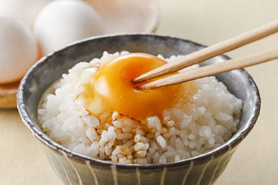 raw egg over rice