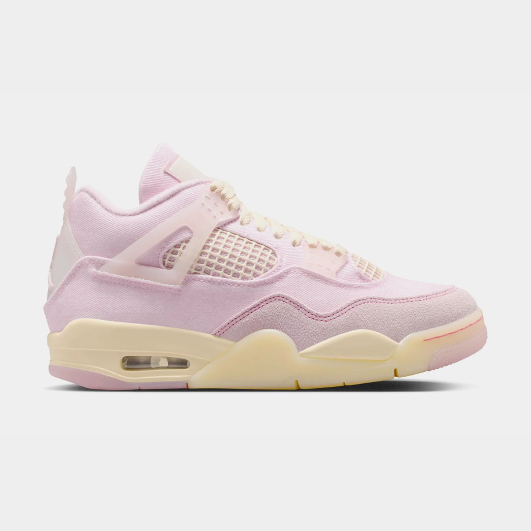 Pink Air Jordan 4 sneakers with cream accents, side view on a gray background.