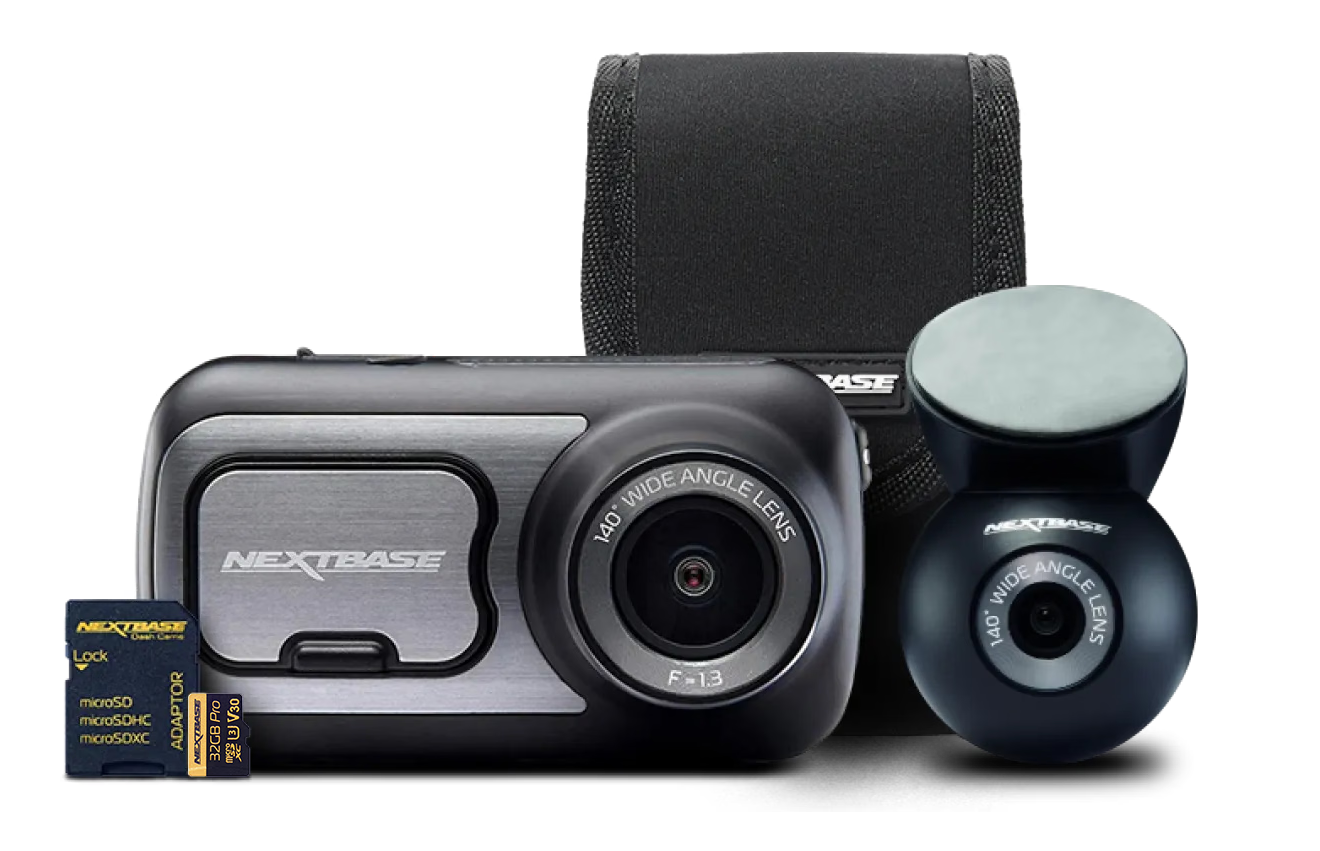 A dashcam with accessories including a memory card and mount.
