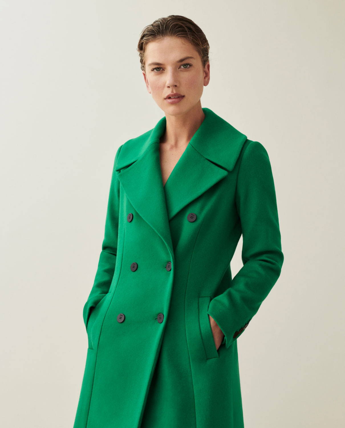 Model wears emerald wool cashmere blend Knightley coat