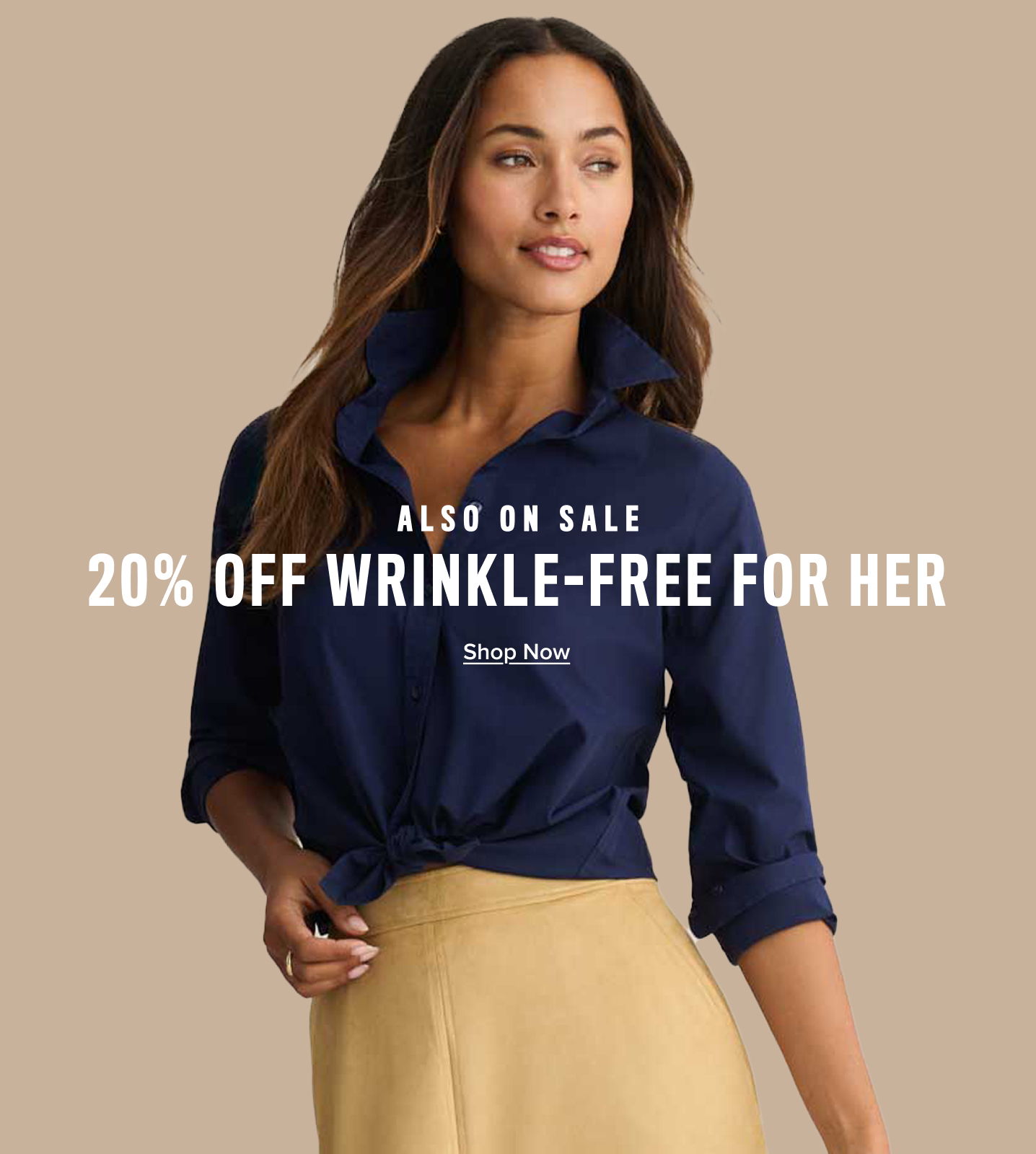 Woman wearing a navy shirt, promoting 20% off wrinkle-free clothing for her.