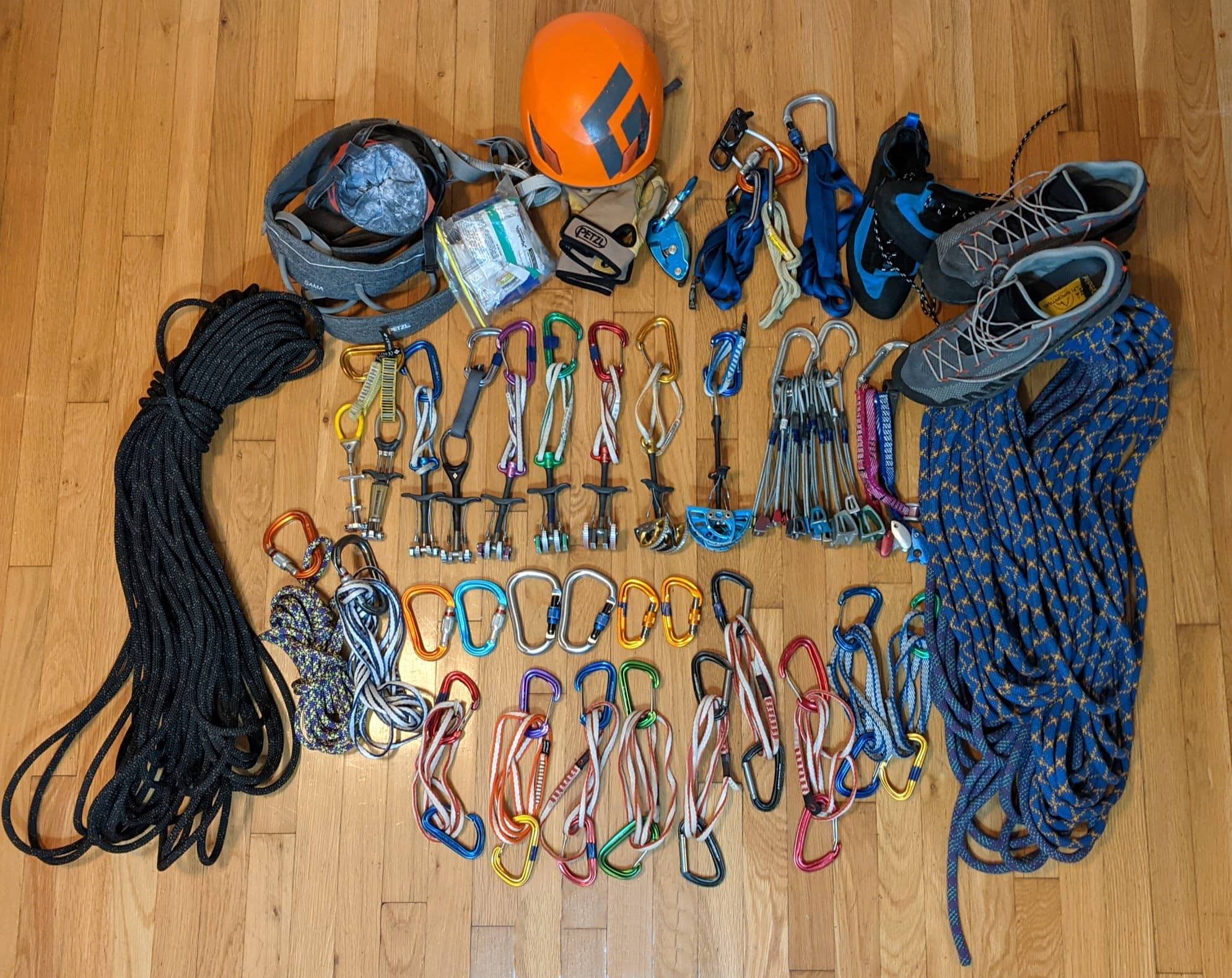 A typical trad climbing rack. Showing the variety of gear needed.