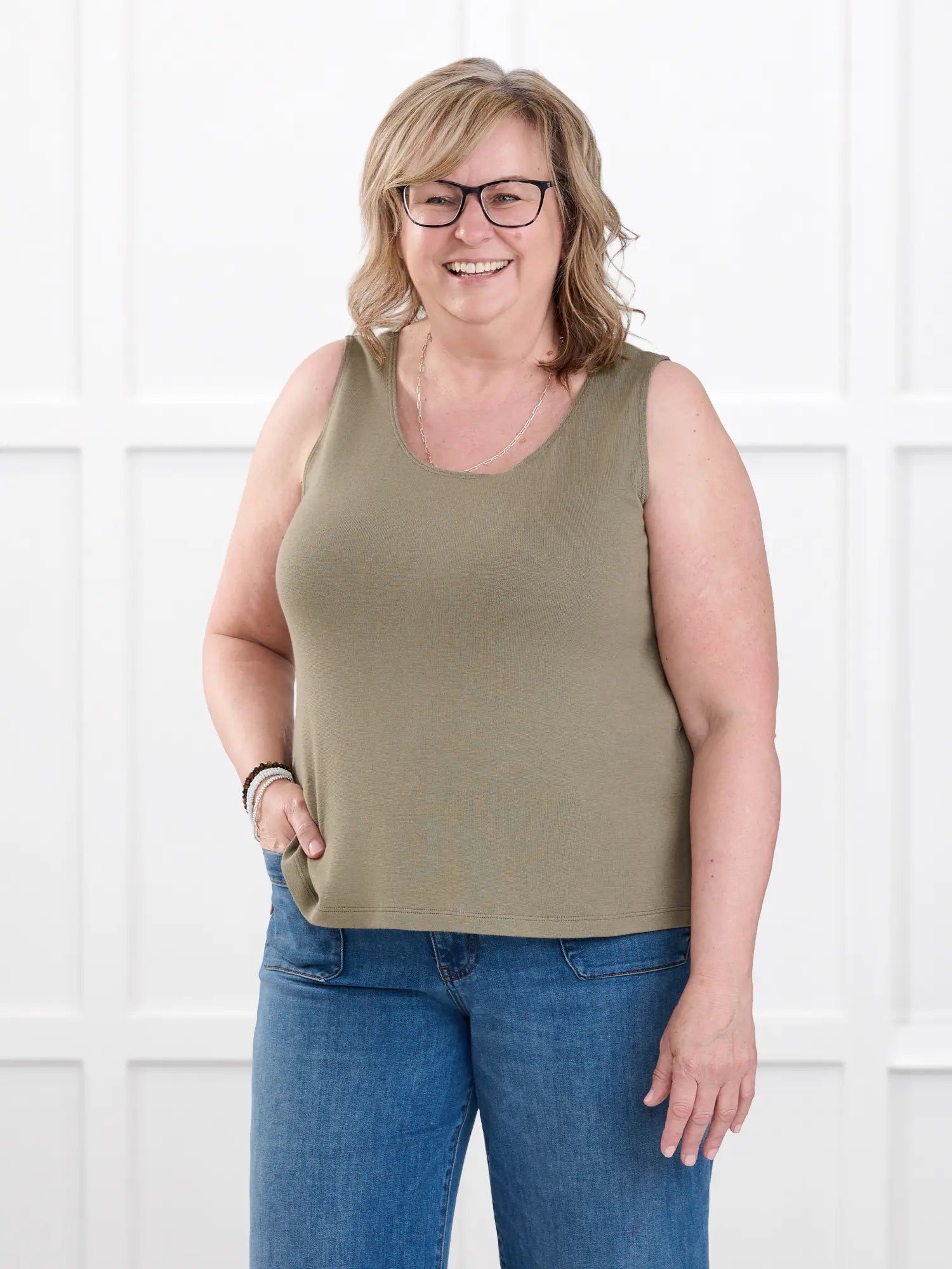 Ricki reversible neckline sweater knit tank for women in Thyme on model Deb, size XL @Deb-XL #en:color_thyme,fr:couleur_thyme