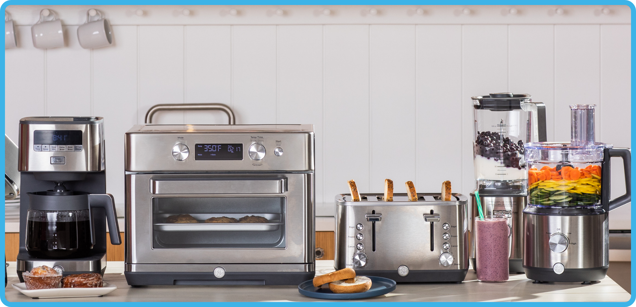 A collection of kitchen appliances on a countertop.