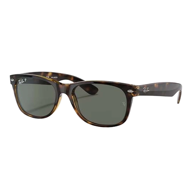 Tortoiseshell sunglasses with dark lenses on a white background.