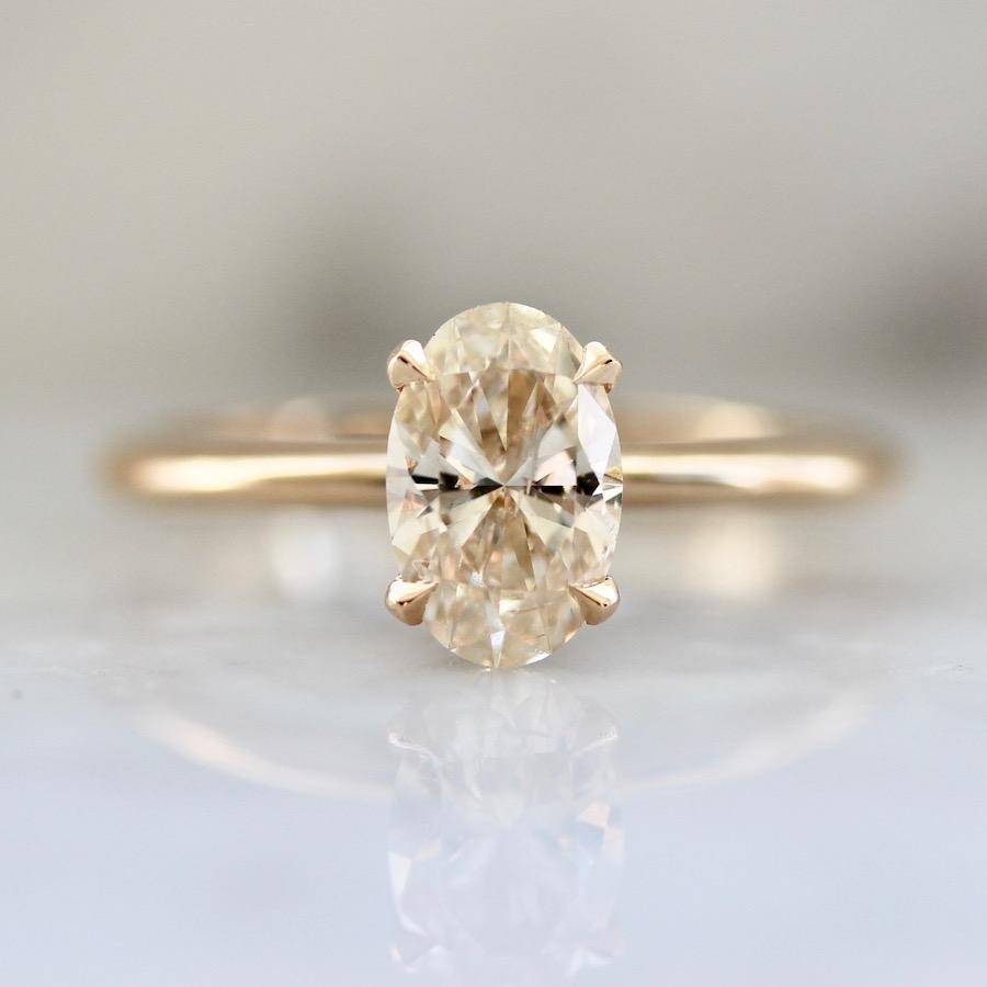 Oval cut light champagne diamond ring