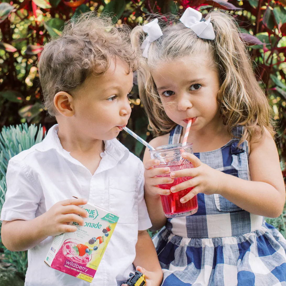 Little boy and girl sipping True Lemon Lemonade