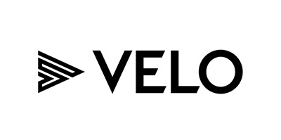 A picture of VELO's logo, which is just VELO spelt out in caps with a sideways triangle
