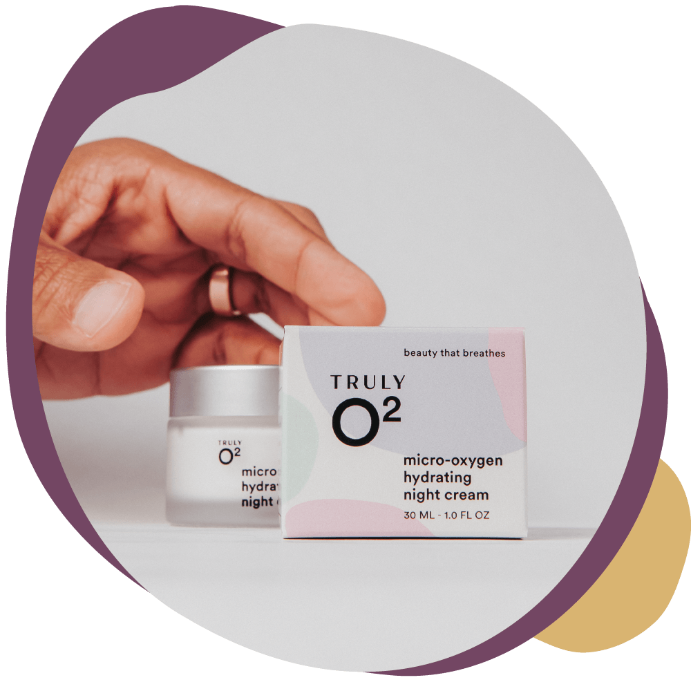 hand reaching for micro-oxygen hydrating night cream