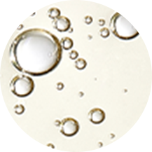 Bubbles in a light-colored liquid background.