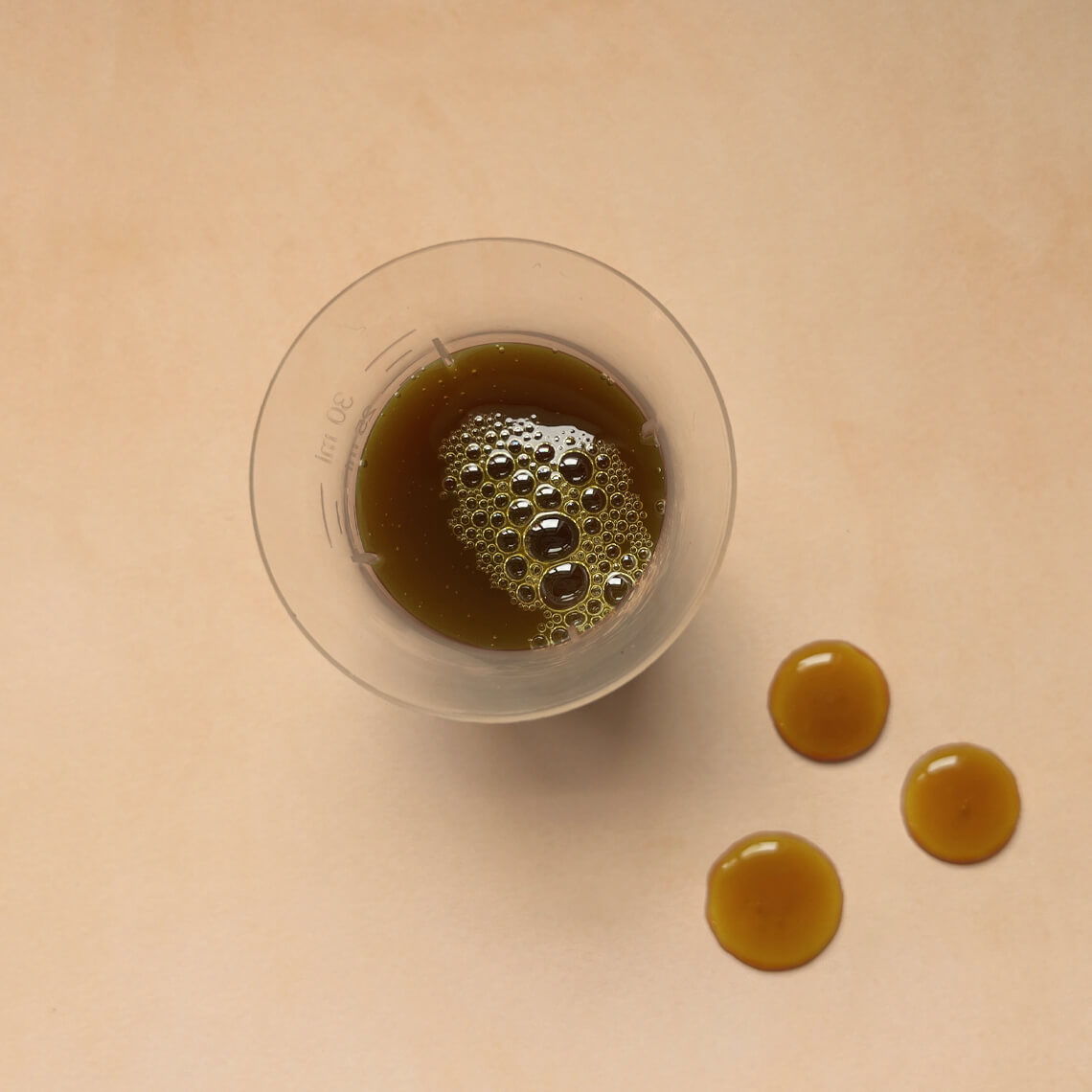 15ml serving of FOLLICLE FOOD for hair nutrition