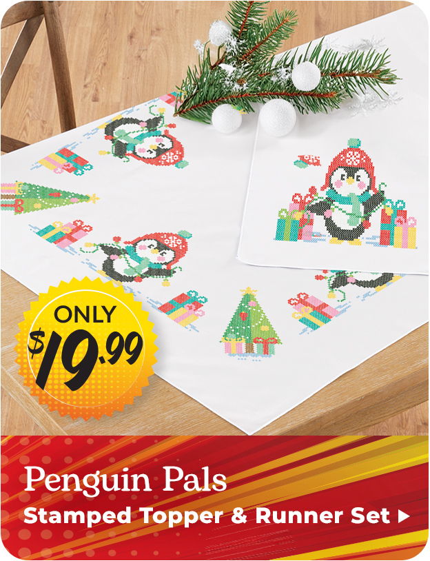 Penguin-themed table decor set with holiday designs and a price tag. Penguin Pals Stamped Topper & Runner Set