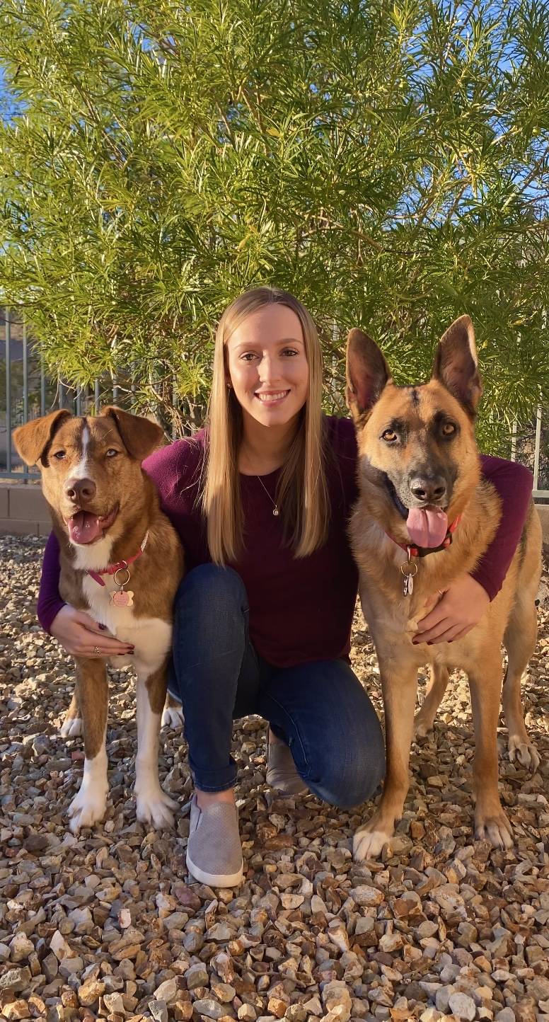 Kayla Kowalski, Certified Canine Nutritionist, and her two dogs.