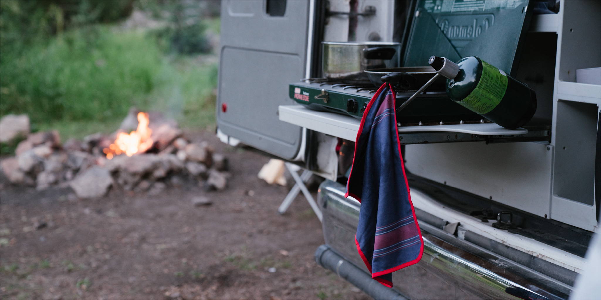 Shammy towel hanging off portable stovetop on truck