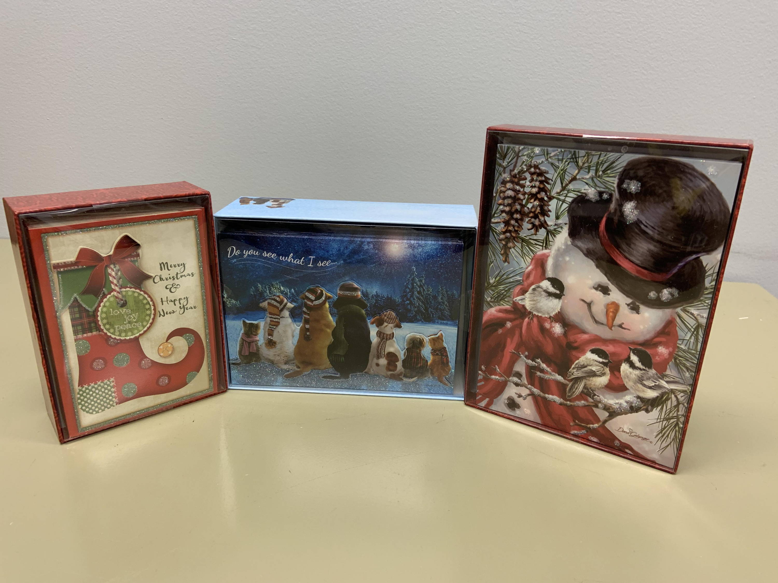 boxed christmas cards stocking, snowman with birds and waiting for santa