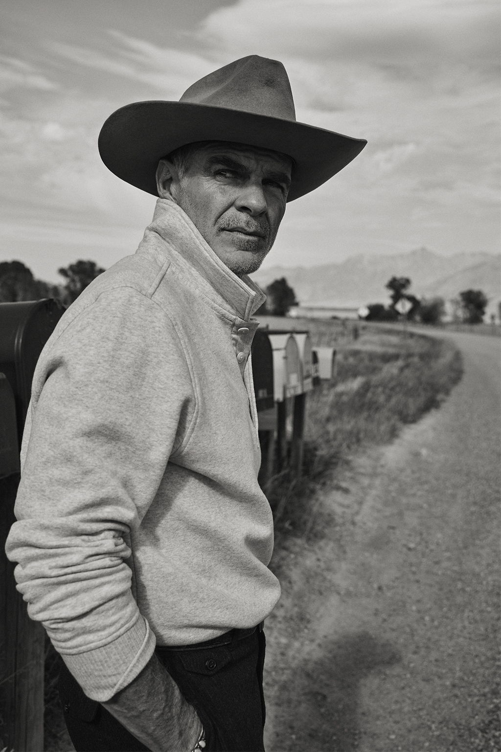Michael Kelly in the Torino Cotton Cashmere Fleece Polo with vintage stetson hat in Emigrant, Montana
