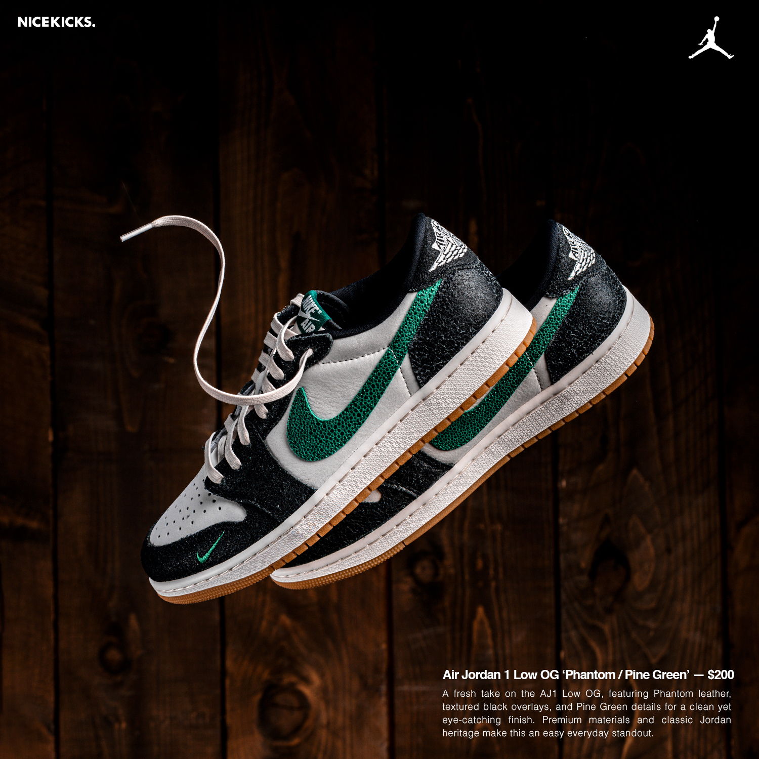 A pair of stylish black, white, and green sneakers on a wooden background.