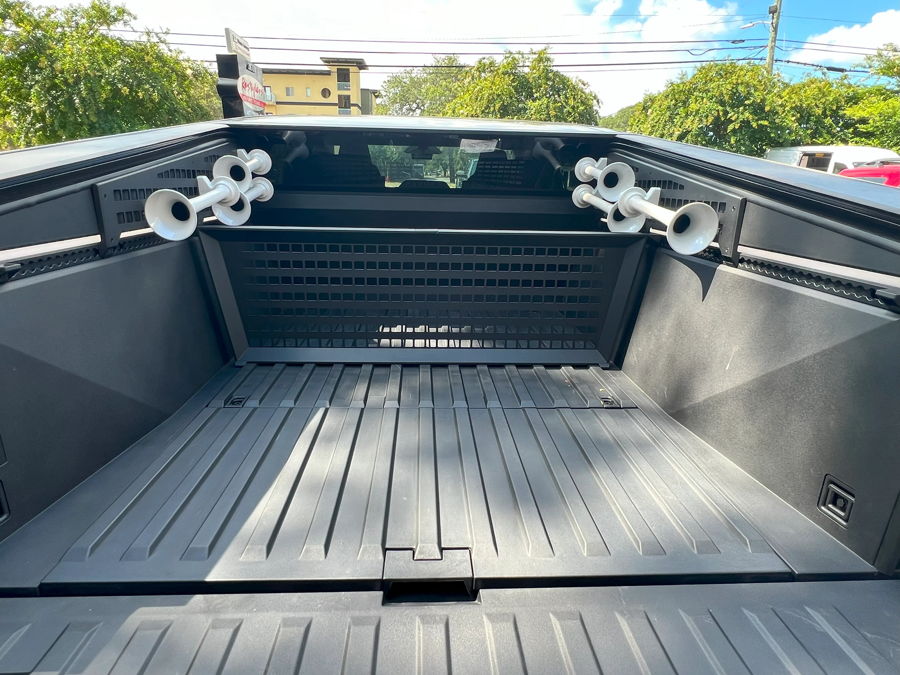 Dual white quad-bell train horn sets side rails tailgate view Restylers Tesla Cybertruck Shocker S6 544K gallery photo 9