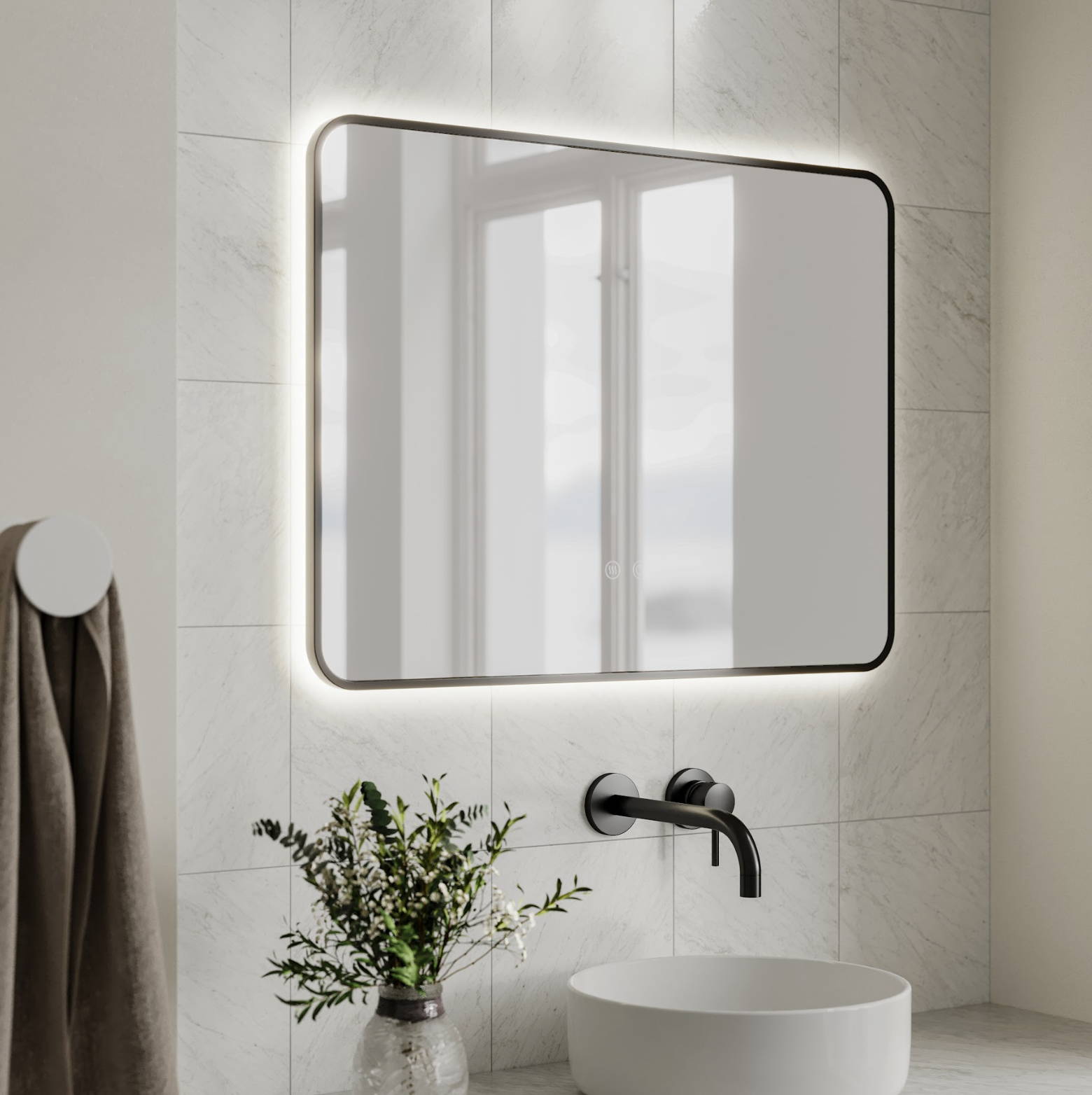 Soft lit bathroom with rectangle mirror with black frame