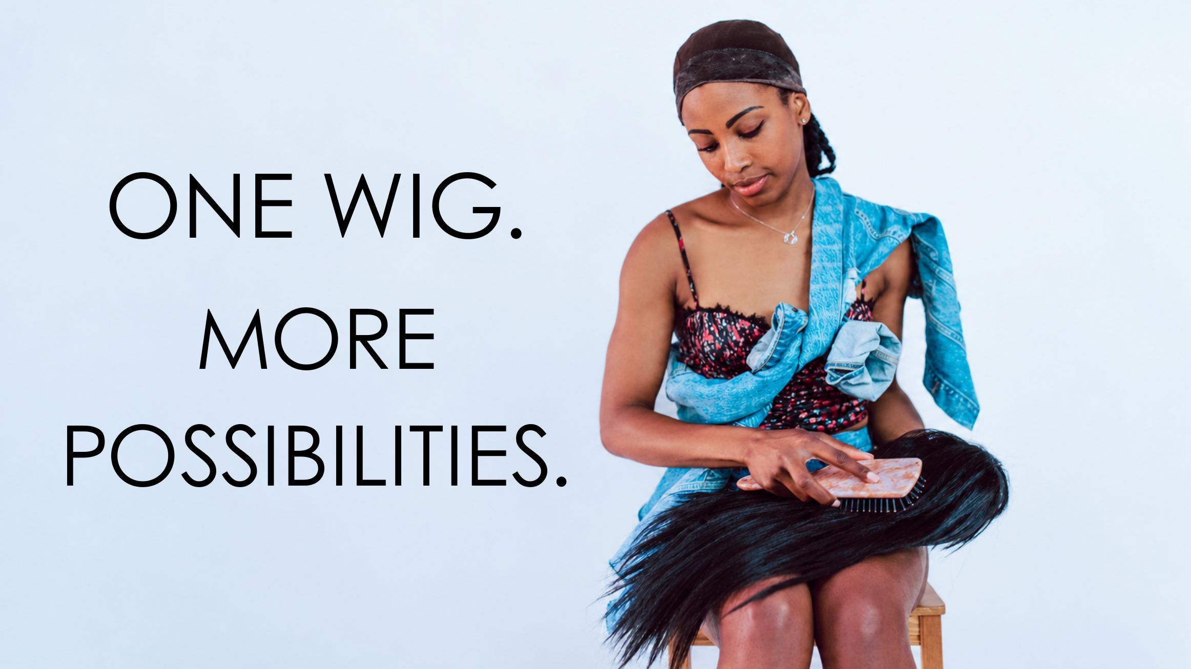 Woman styling a wig with text: