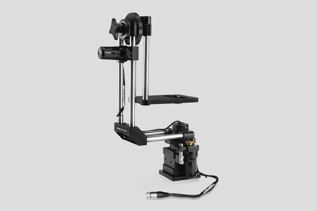 3D printer with a vertical design and attached components.