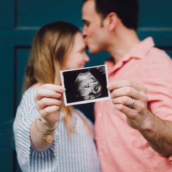 Couple Holding Pregnancy Picture