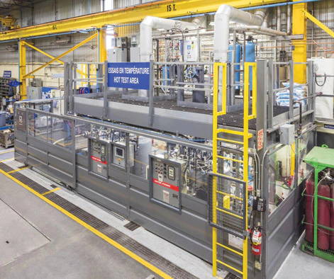 Mezzanine with equipment stored on top and safety partition around bottom of mezzanine