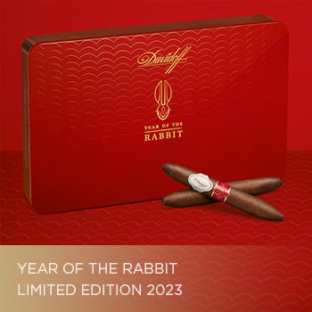 Year of the Rabbit Limited Edition 2023 cigar box with crossed cigar lying in front of it.
