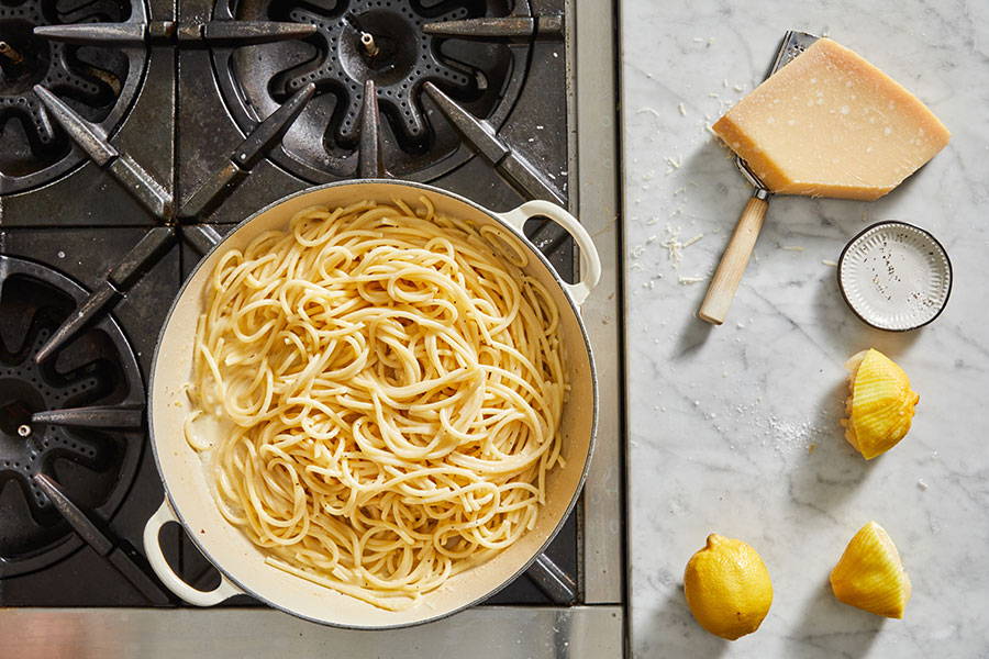 Serve the pasta topped with lemon peel strips and a pinch of black pepper.