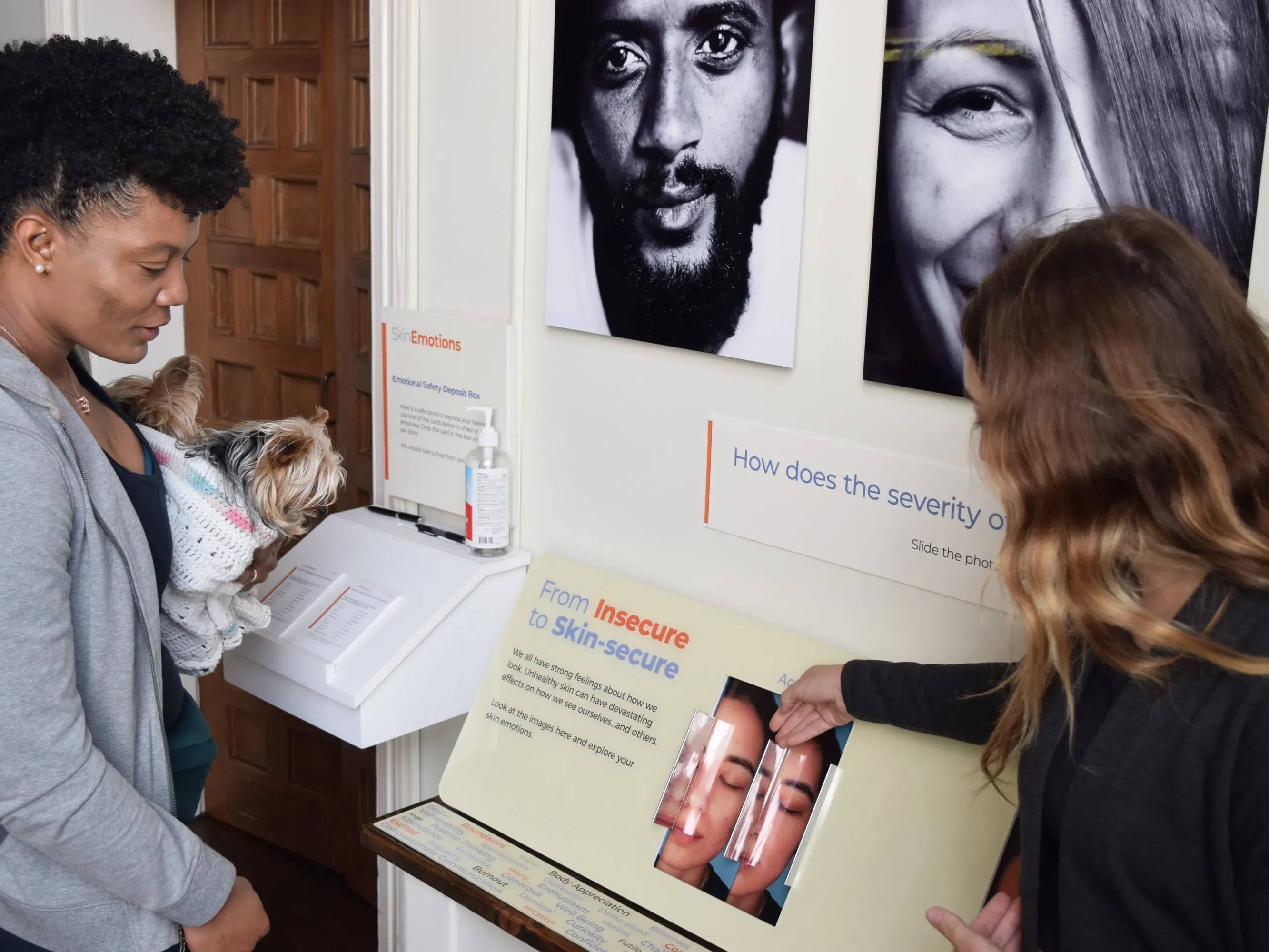 Two people view an exhibit titled 