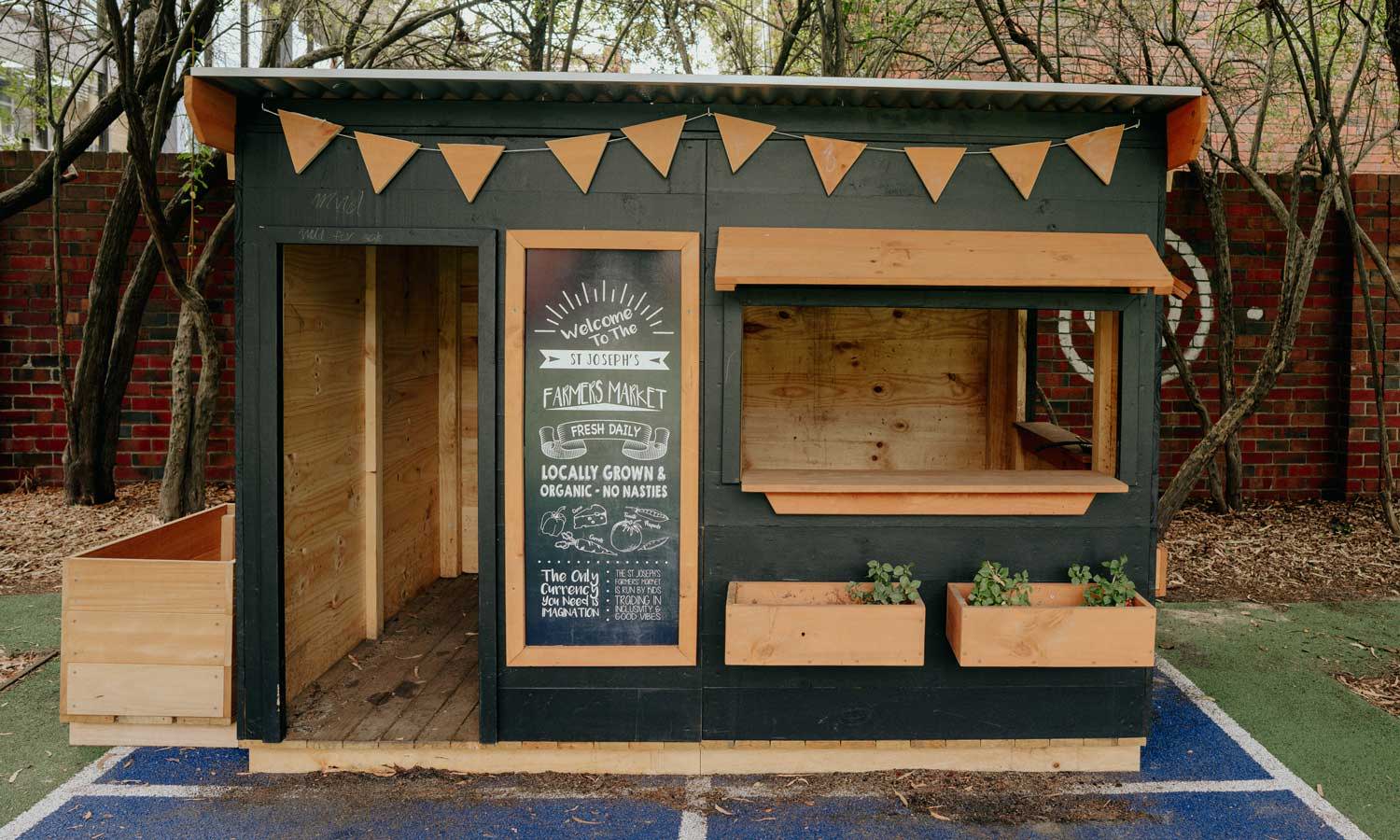 A farmer's market style cubby house for commercial, primary school, and childcare centre, themed cubby house