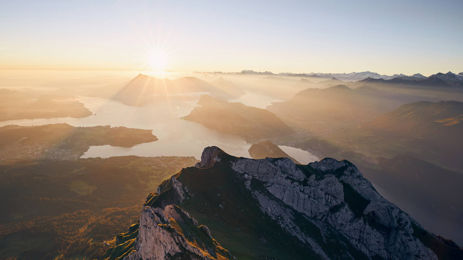 Sunrise over a mountain range. Photo used for Future Fields sustainability webpage.