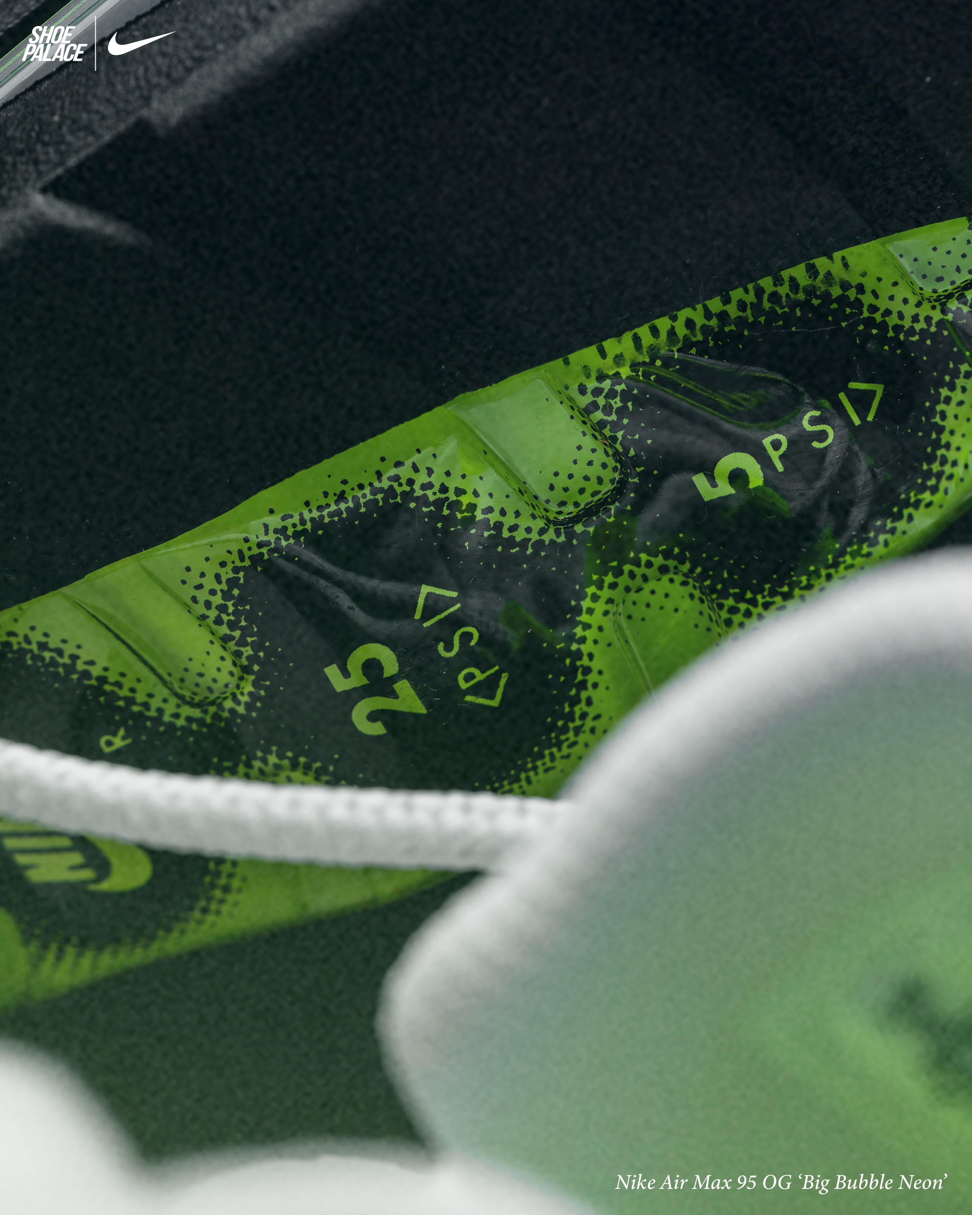 Air Max 95 Big Bubble Neon - Close-up of shoe interior showing Nike branding and size details.